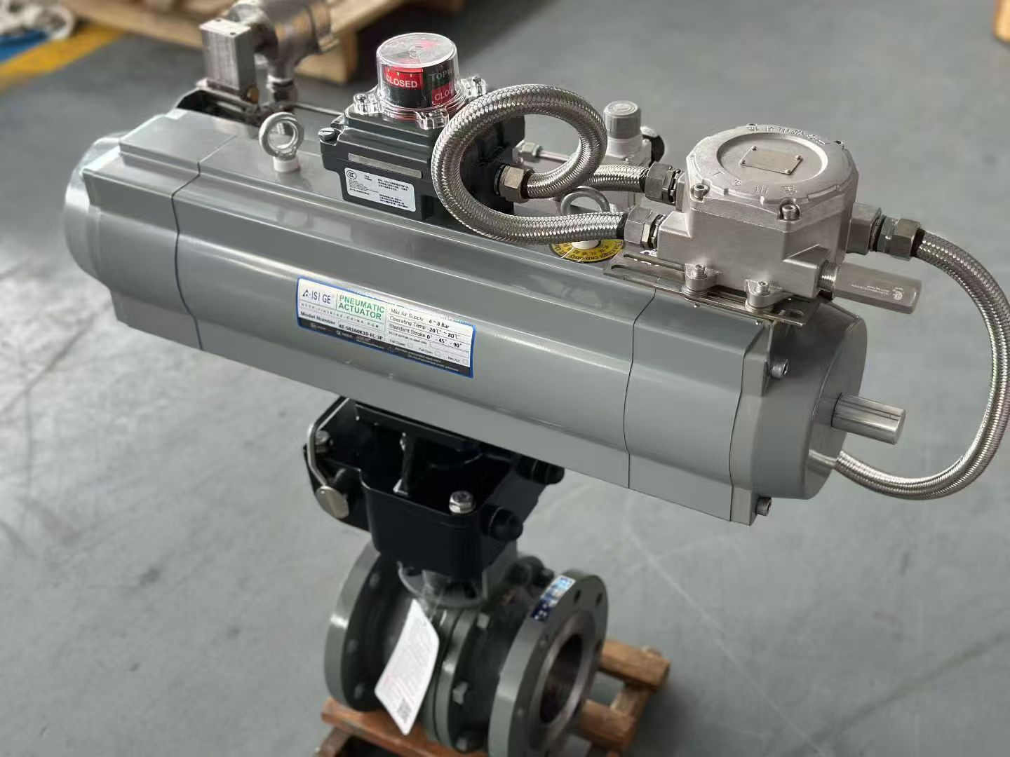 Side view of three-stage pneumatic actuator showing PNEUMATIC ACTUATOR label and air connections